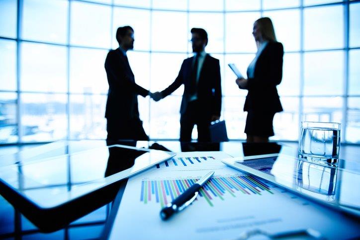 Business meeting with professionals discussing aircraft sales
